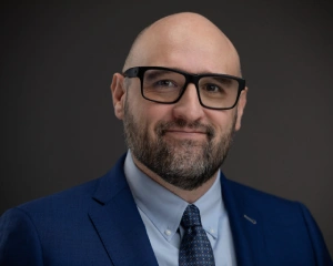Professional image of Camron Dovalina.